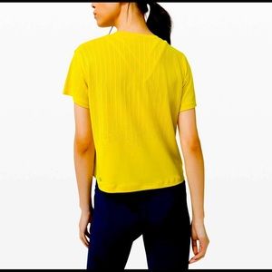 Yellow Lululemon Train to Be short sleeve size 4